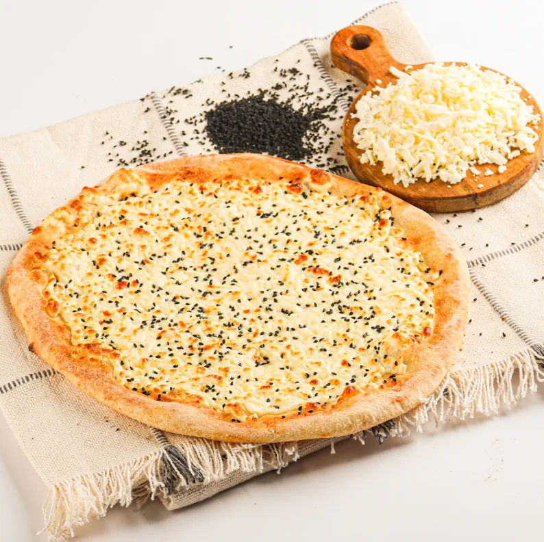 A manakeesh with melted cheese